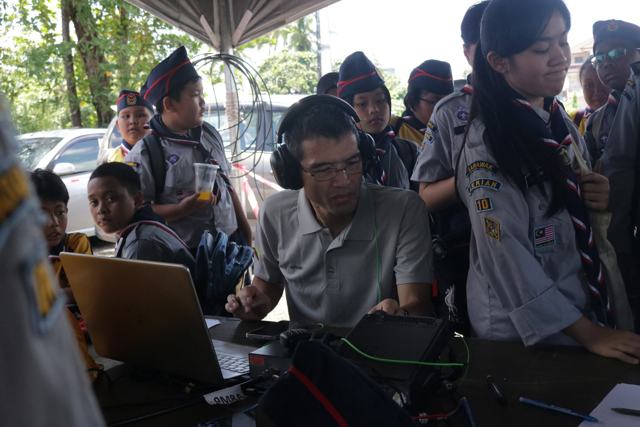 On the air — HF operating with Scouts looking on